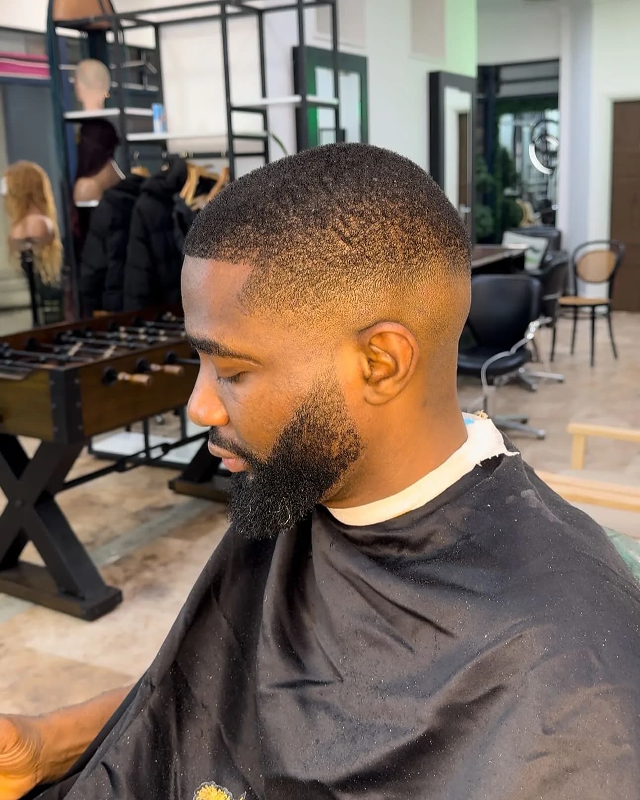 A precision men's fade and beard