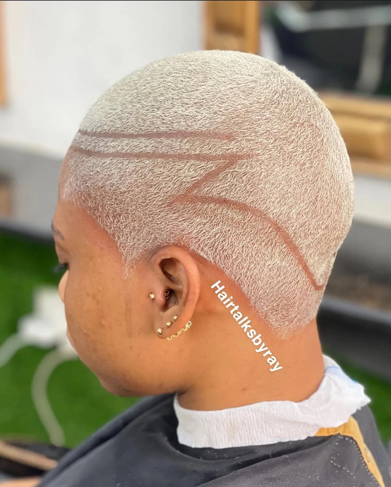Platinum blonde colour with creative hair art